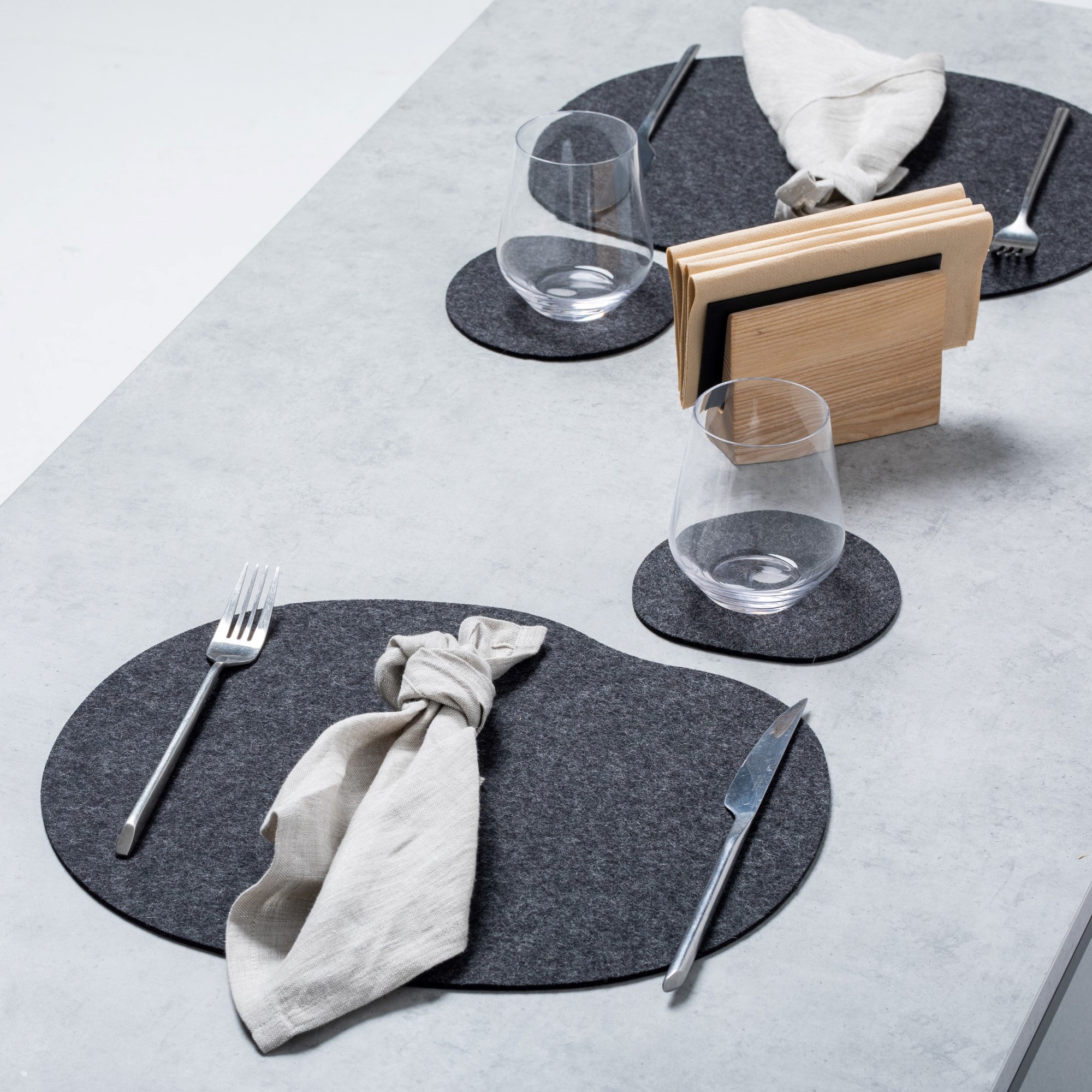 Natural wool felt placemats. Gray or black