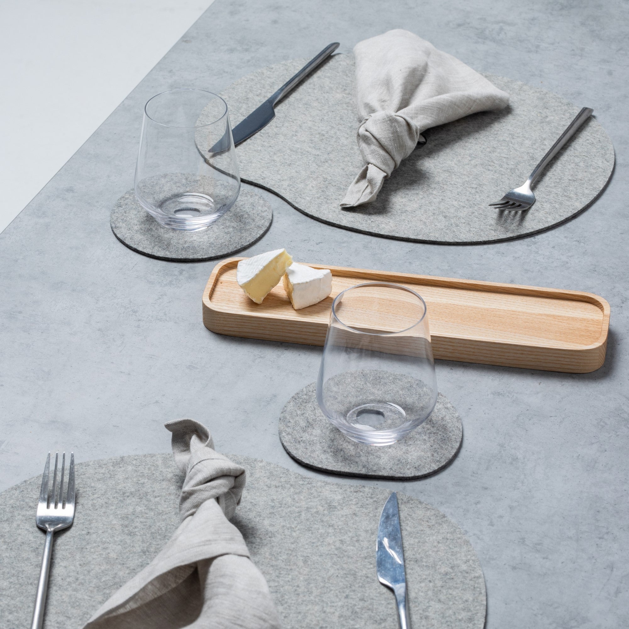 Natural wool felt placemats. Gray or black